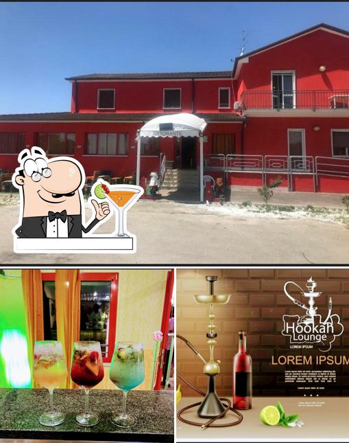 Questa è la foto che presenta la bevanda e interni di Wr ristorante-pizzeria-bar