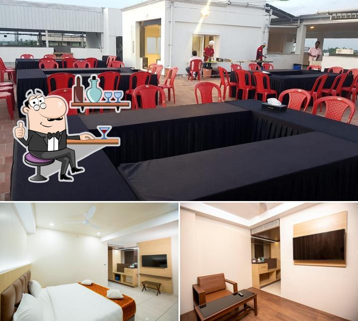 Take a seat at one of the tables at LEE BENZ-ARK HOTEL
