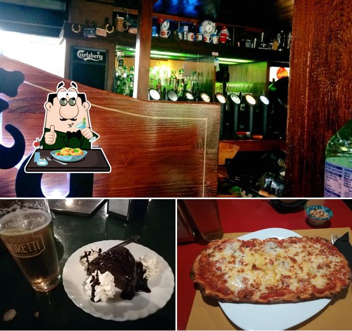 Rio Bravo - Pub & American Grill si caratterizza per la cibo e bancone da bar