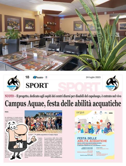 Siediti a un tavolo di Swimland Cafè