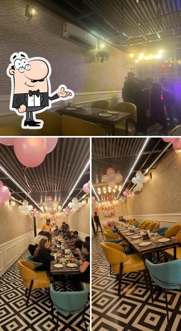 Take a seat at one of the tables at Bbq Halt