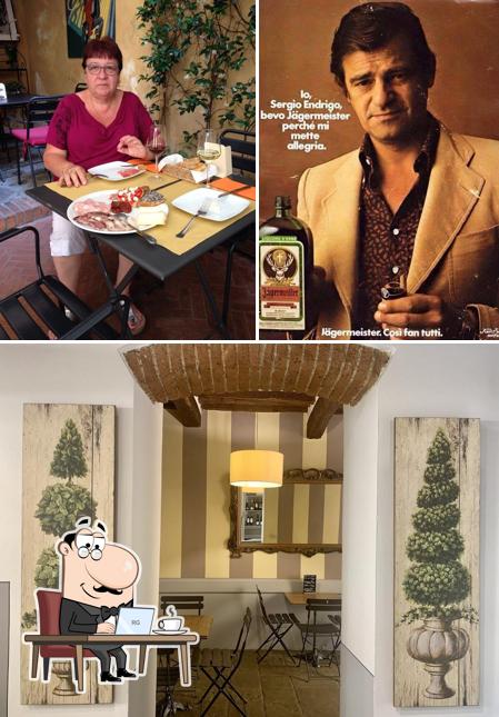 Questa è la foto che presenta la interni e bevanda di Caffè La Corte