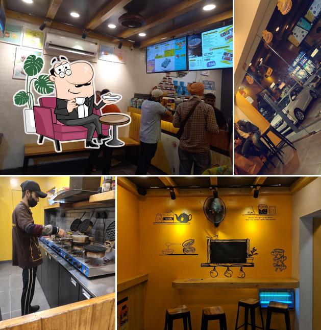 Take a seat at one of the tables at The Belgian Waffle Co