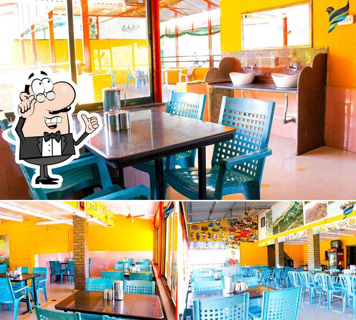 The interior of Madhur Pure Veg Restaurant