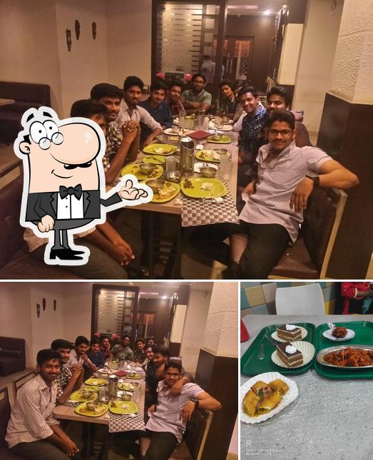 Take a look at the image displaying interior and food at Sri Nagarjuna Parklane Bakers