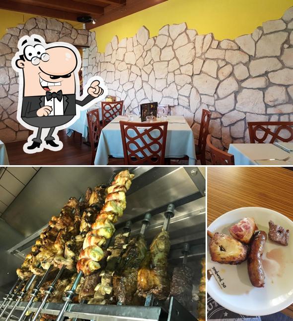 Dai un'occhiata agli interni di Os Pampas Churrascaria Brasileira