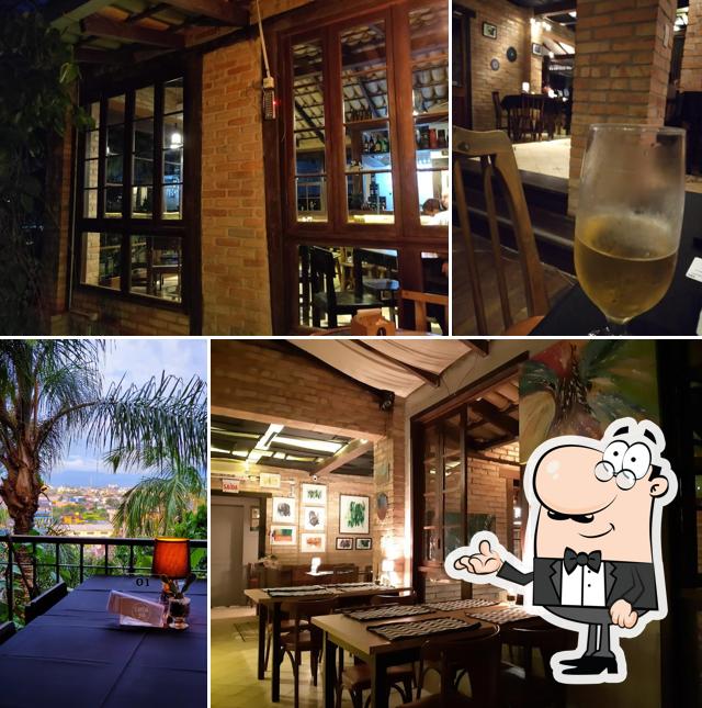 Sente em uma das mesas no Casa 97 - Bar e Restaurante