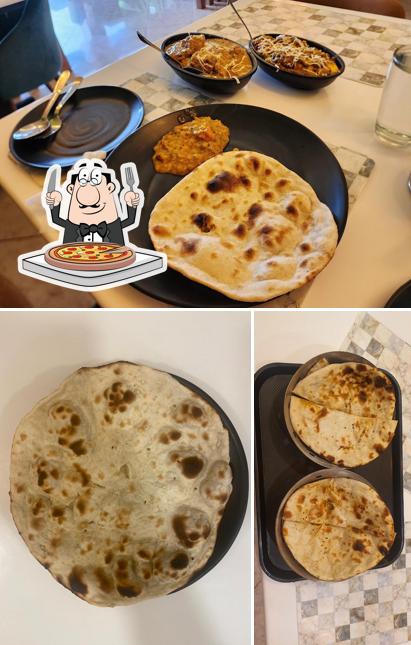 Pick pizza at Prem Restaurant