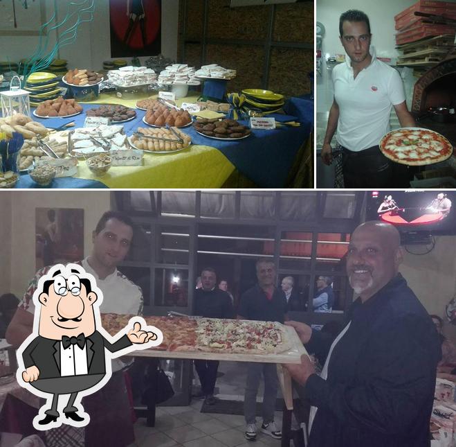 La immagine della interni e cibo di Pizzeria Da Zio Santo. Parenti