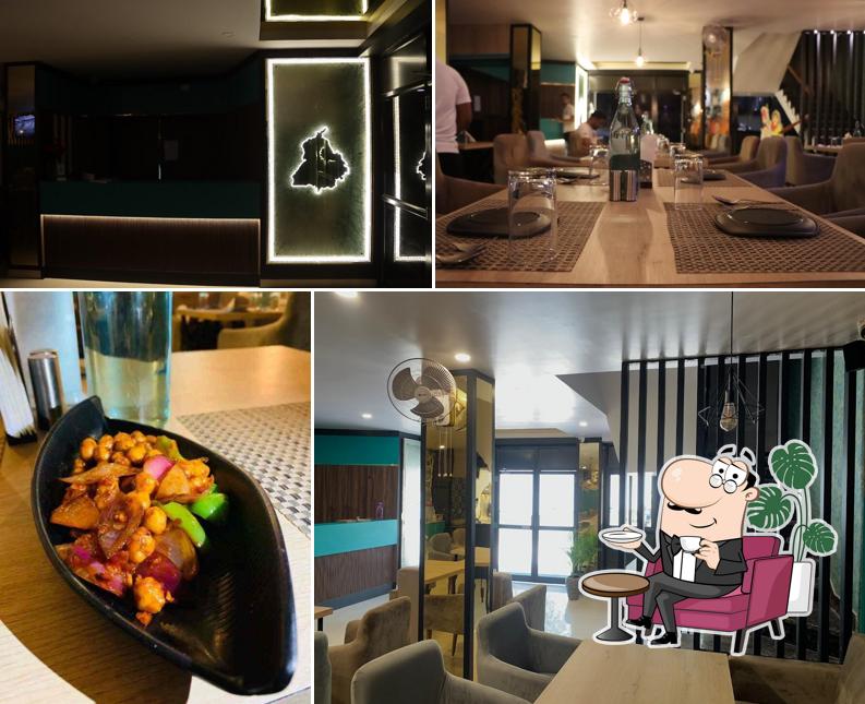 Take a seat at one of the tables at Panjab Warga Restro Bar