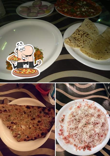 Pick pizza at Hotel Kailash Parvat