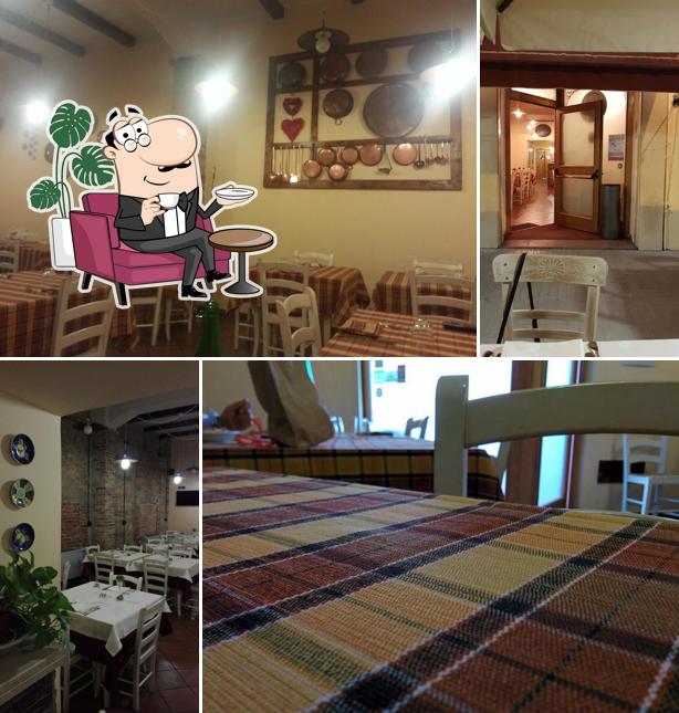 Dai un'occhiata agli interni di L'Osteria degli Amici