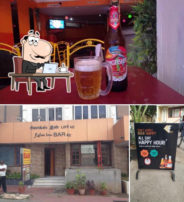 Take a seat at one of the tables at Relax Inn Bar