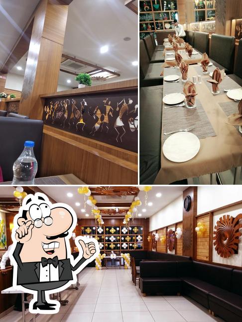 The interior of Hariom restaurant and BANQUET