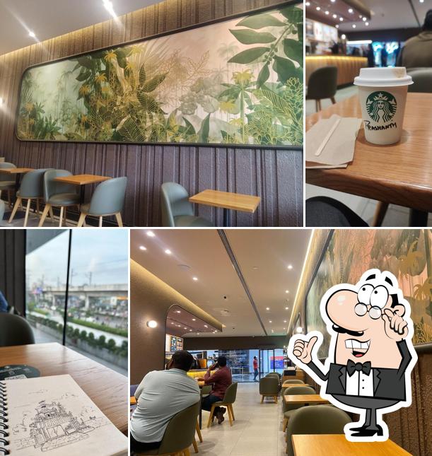 Take a seat at one of the tables at Starbucks