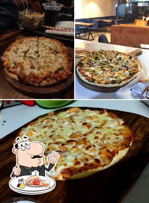 Get pizza at Tasty Bites