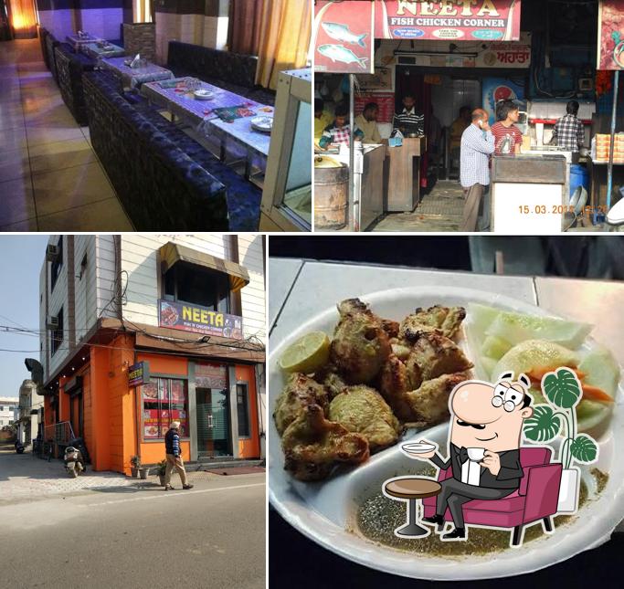 Take a seat at one of the tables at Neeta's Chicken & Fish Corner