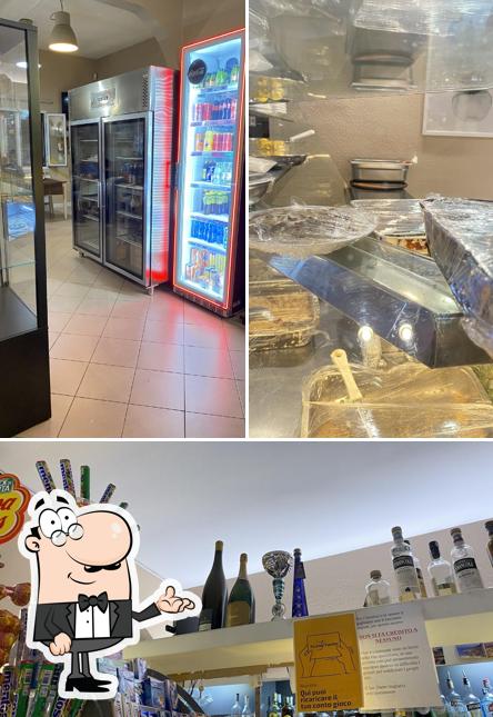 La foto della interni e bancone da bar di Pizzeria Bar Trattoria via Dante