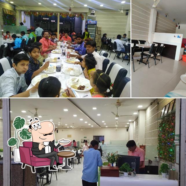 The interior of Hotel Neha Pure veg