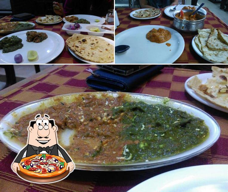 Pick pizza at Amrita Pure Veg