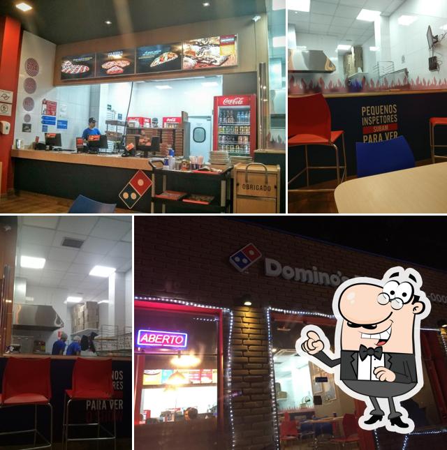 Sente em uma das mesas no Domino's Pizza - Presidente Vargas