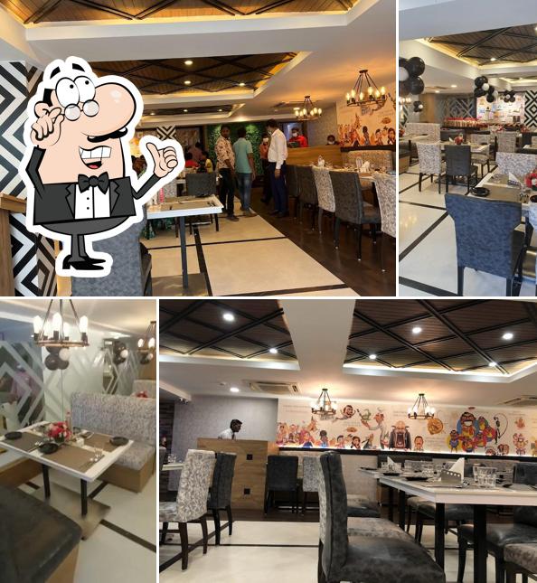 Take a seat at one of the tables at Mirchi Express Restaurant