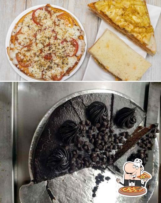 Try out pizza at Om Sai Food Court