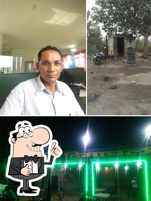 Here's a picture of Tau Ka Himachal Veg Dhaba