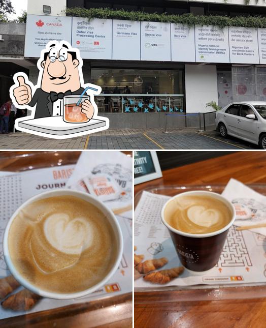 The photo of Barista Cafe Urmi axis’s drink and exterior