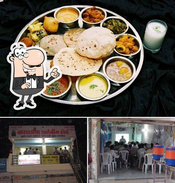 The photo of interior and food at Dwarkadhish Kathiyawadi Restaurant Dhanera & AC Holl