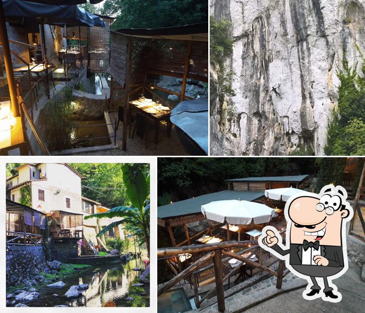 Puoi goderti l'aria fresca da seduto all'esterno di Osteria Candalla