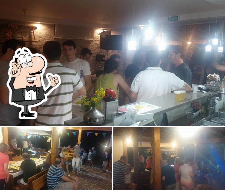 Siediti a un tavolo di Da Zhendron Rifugio Pianezze di Beatriz Bizerra