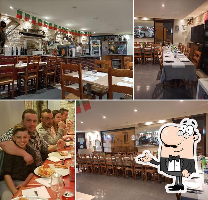 Installez-vous à l'une des tables de Pizzeria Di Angelo