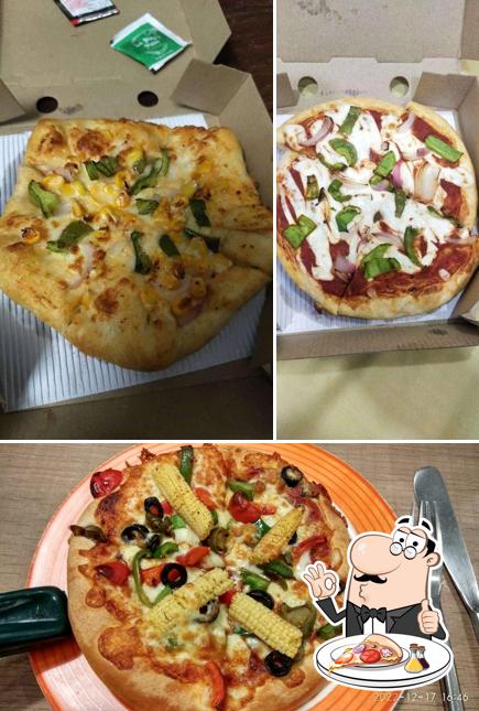At Pizza Hut Vastrapur, Ahmedabad, you can enjoy pizza