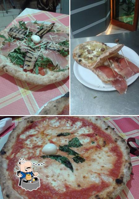Platti al Pizzeria New Grande Fratello