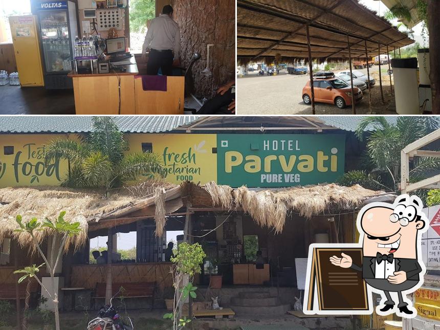 The image of Hotel Parvati Pure Veg- Managed by Divine Hospitality Satara’s exterior and interior