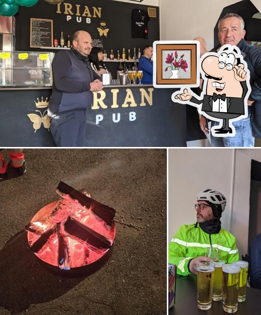 Questa è la foto che mostra la interni e cibo di Irian pub