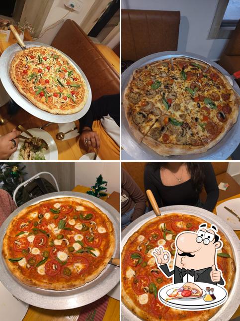 Get pizza at Banerjeeoli's Pizzeria