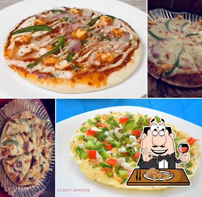 Get pizza at Charlie The Coffee Junction