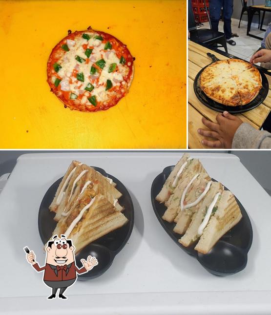 Food at Pizza Nimos Best pizza Burger sandwich and momos, Best food in Vadodara