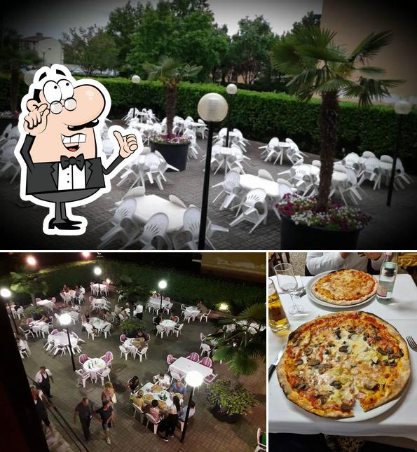 Tra le diverse cose da Pizzeria Giardino si possono trovare la interni e pizza