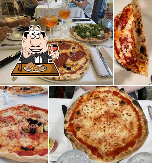 Prenditi una pizza a Ristorante Pizzeria Cavallo Bianco