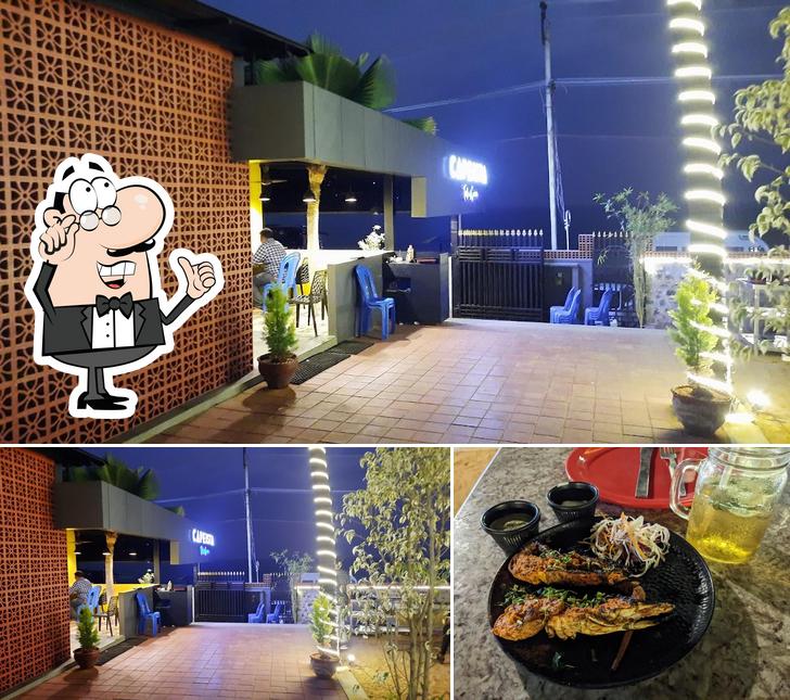 This is the image showing interior and meat at Capeista Restaurant