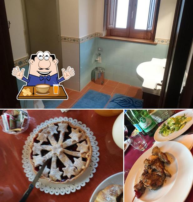 Questa è la foto che presenta la cibo e interni di Le Conche - country house