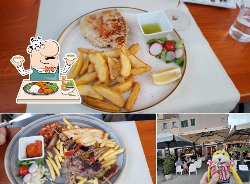 Cafe "DOLPHIN" si caratterizza per la cibo e interni