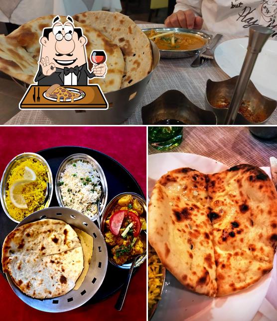 Prenditi una pizza a La Curcuma Ristorante Indiano