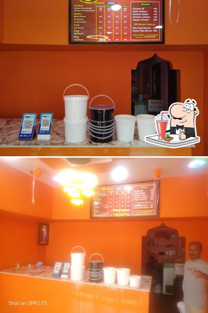 Enjoy a beverage at R R BUCKET BIRYANI
