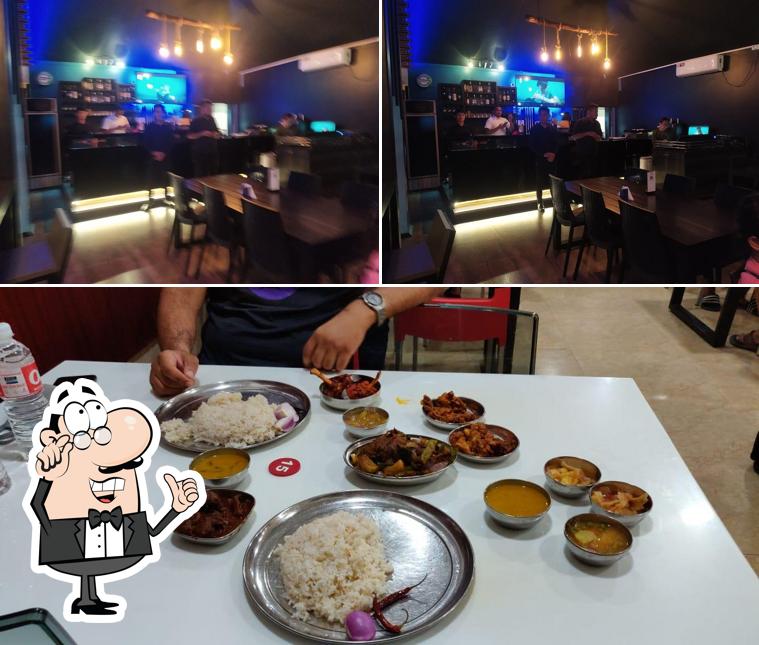 Take a seat at one of the tables at XL Restaurant