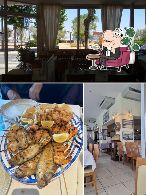 Siediti a un tavolo di Pappagallo Ristorante Pizzeria