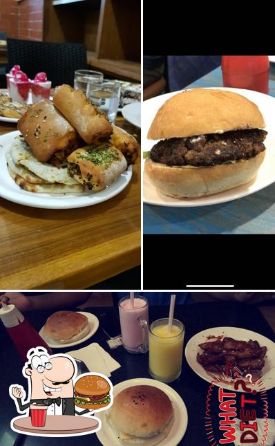 Order a burger at Cafe Graffiti